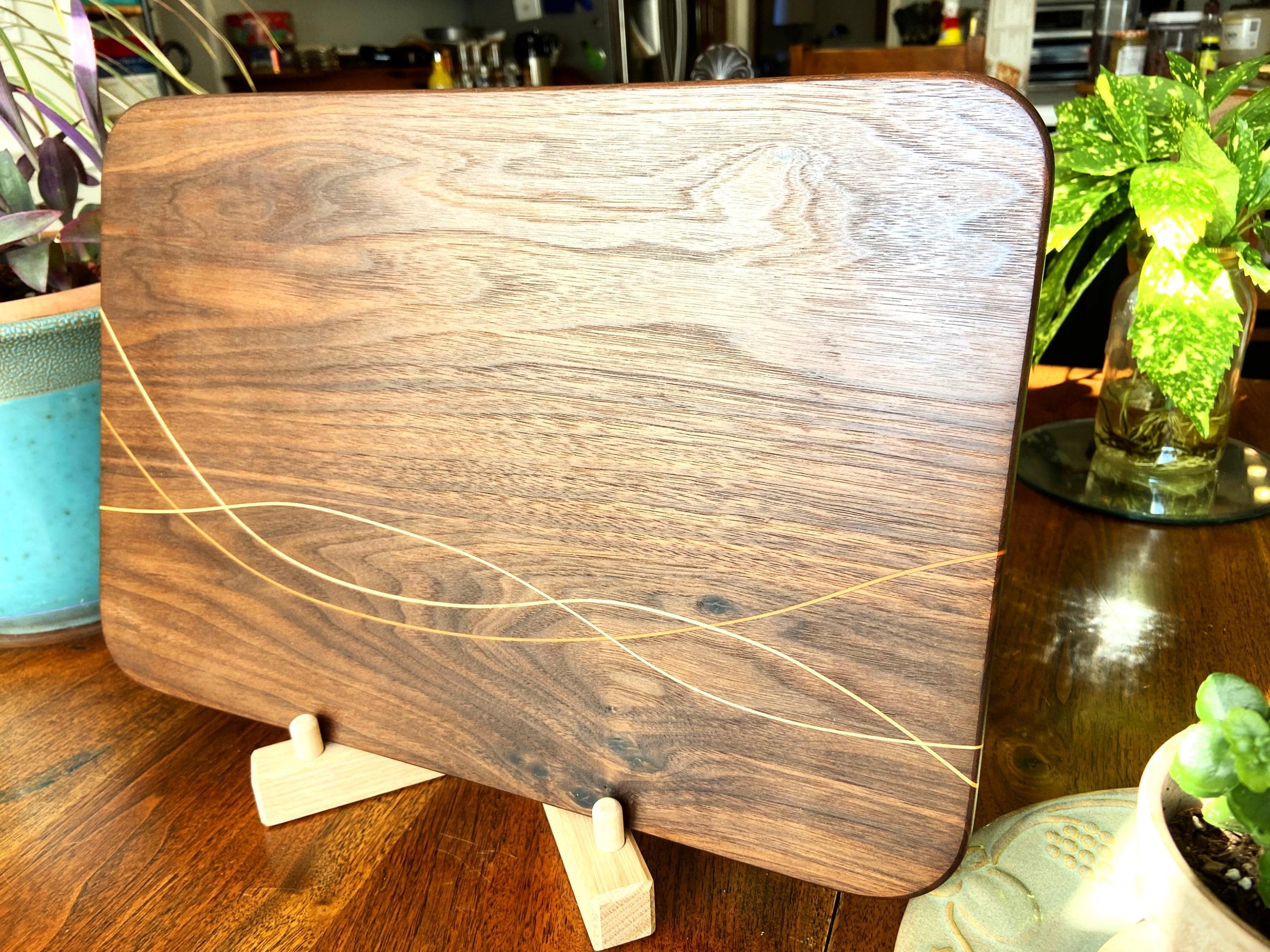 Peruvian Walnut charcuterie board - unique Maple and Cherry banding/inlay.